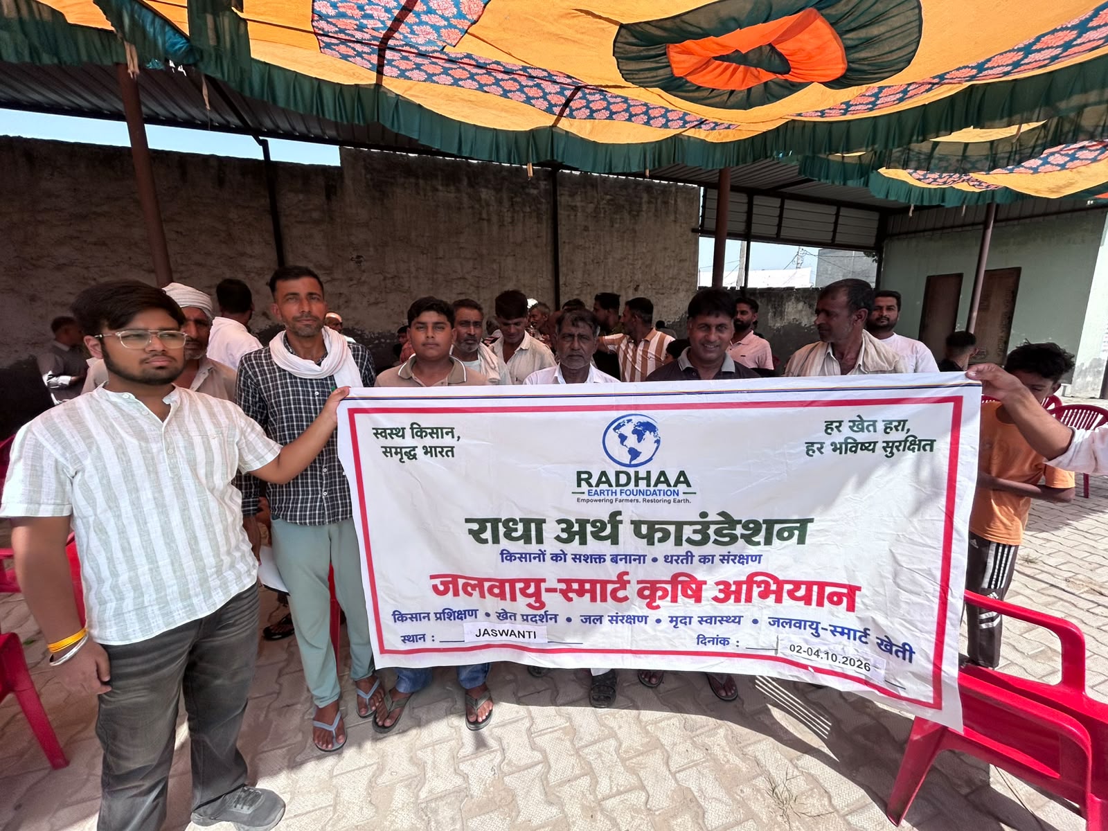 Farmers and RADHAA team members at the climate-smart agriculture campaign in Jaswanti
